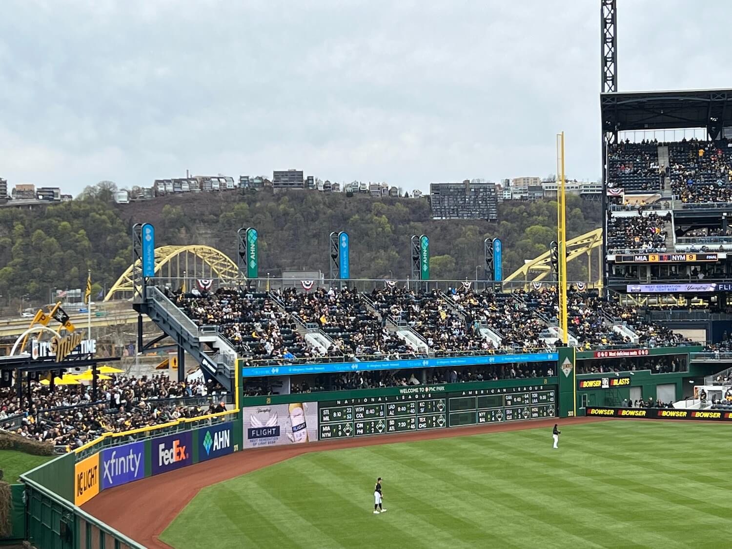 Pirates fans weren’t depressed (yet) on opening day 2023. Their attire was in reply to a summons from prodigal son, Andrew McCutchen, to stage a classic Pittsburgh black out. Where it’s now Miller Time in the outfield, Janet Marie Smith removed six rows of bleachers to create a place where fans can “live in the view” of both the Allegheny River and the game.