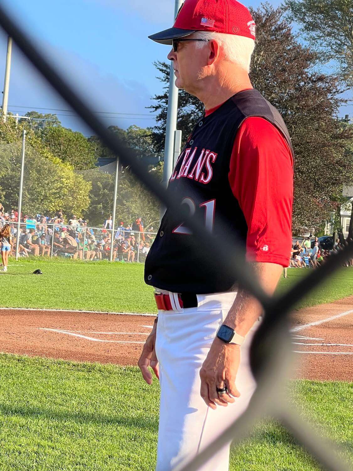 Coach Kelly Nicholson lets her take infield with the guys, throwing her grounders and pop ups.