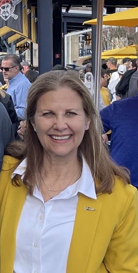 Janet Marie Smith in Pittsburgh mufti mingling with the people.